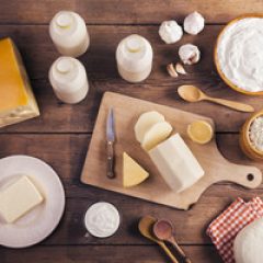 graphicstock-variety-of-dairy-products-laid-on-a-wooden-table-background_SCx3wM96ZW_thumb
