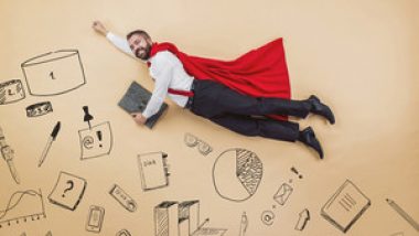 graphicstock-manager-in-a-super-hero-pose-wearing-a-red-cloak-studio-shot-on-a-beige-background_rAkHz5aW-_thumb