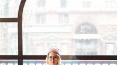 graphicstock-concentrated-young-woman-in-hat-and-glasses-working-with-laptop-in-cafe_BkWgKO0pe_thumb